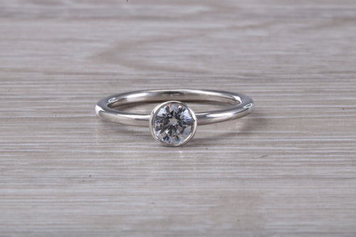 Dainty One carat Moissanite Diamond Platinum Solitaire
