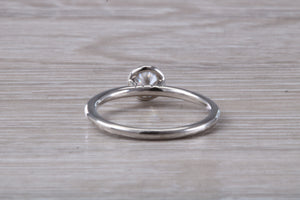 Dainty One carat Moissanite Diamond Platinum Solitaire