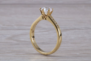 Beautiful Charles and Colvard 1 carat Mossainte with Natural Diamonds set Ring