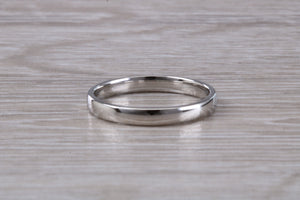 Platinum Diamond Band set with three Round cut Diamonds