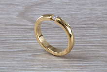 Load image into Gallery viewer, Chunky Yellow Gold Tension set Diamond Band