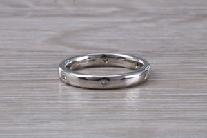 3 mm Platinum Diamond set Band, six Diamonds spaced out all around Band