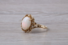 Load image into Gallery viewer, Oval cut Natural Opal set Yellow Gold Ring