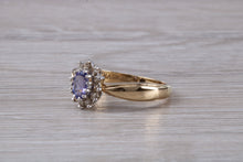 Load image into Gallery viewer, Tanzanite and Diamond Halo Ring