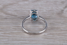 Load image into Gallery viewer, Oval cut Blue Topaz set Silver Ring