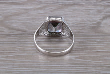 Load image into Gallery viewer, Emerald cut Mystic Topaz set Silver Ring