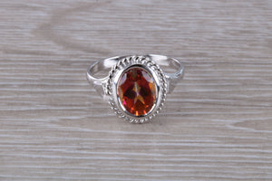 Oval cut Azotic Topaz set Ring
