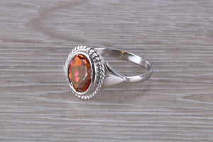 Oval cut Azotic Topaz set Ring