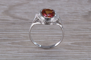 Oval cut Azotic Topaz set Ring