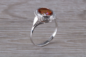 Oval cut Azotic Topaz set Ring