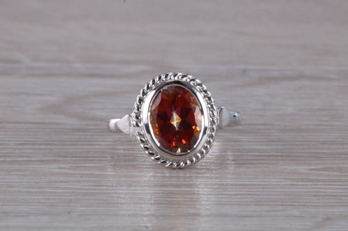 Oval cut Azotic Topaz set Ring