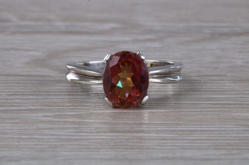 Oval cut Azotic Topaz set White Gold Ring