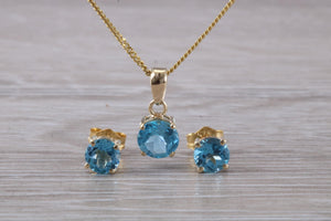 Round cut Blue Topaz Matching Stud Earrings and Necklace set in Yellow Gold