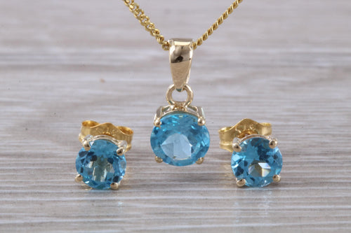 Round cut Blue Topaz Matching Stud Earrings and Necklace set in Yellow Gold