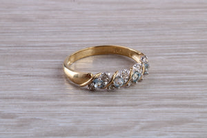 Blue topaz and diamond set ring. 9ct yellow gold with real diamonds and real topaz