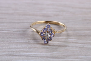 Tanzanite and Diamond set Yellow Gold Ring