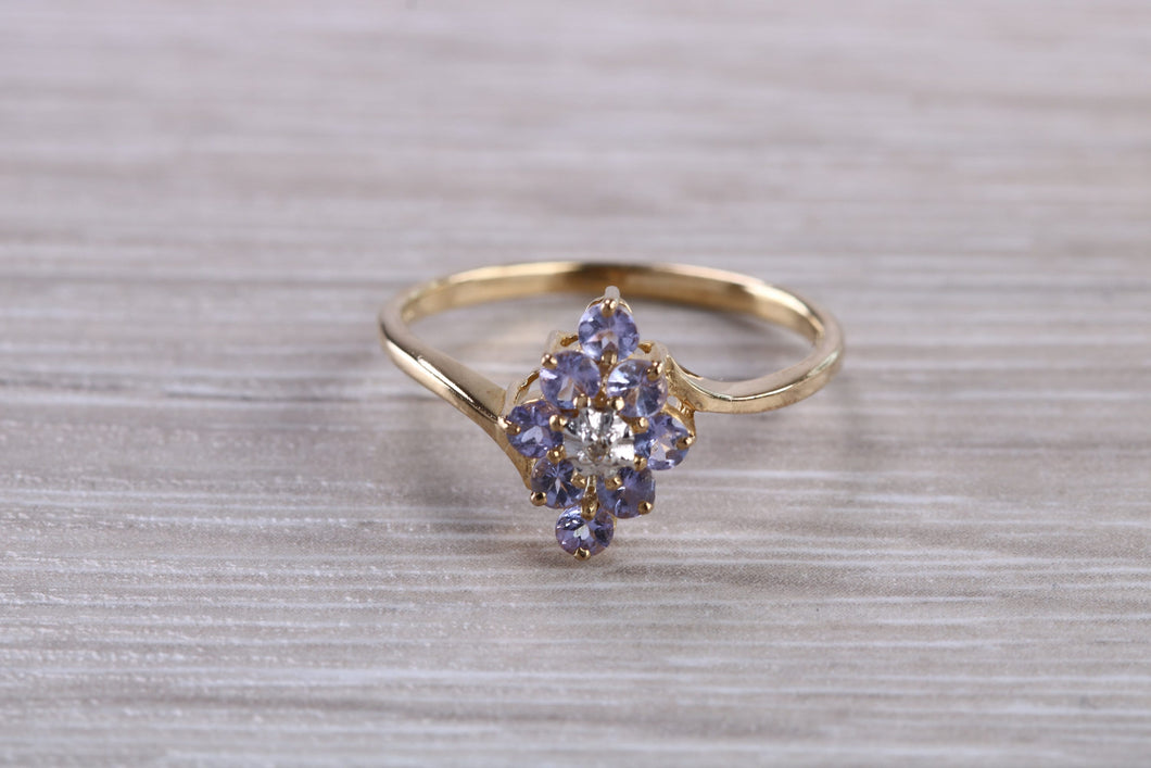 Tanzanite and Diamond set Yellow Gold Ring