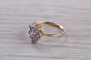 Tanzanite and Diamond set Yellow Gold Ring