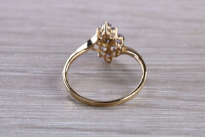 Tanzanite and Diamond set Yellow Gold Ring