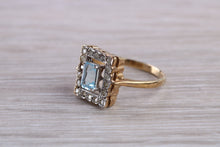 Load image into Gallery viewer, Blue Topaz and Diamond set Yellow Gold Ring