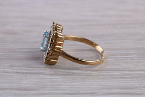 Blue Topaz and Diamond set Yellow Gold Ring