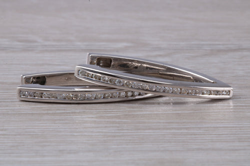 Very long Diamond set half hoop earrings. 18ct Gold with Latchback fittings, very very dressy earrings with top F VS1 grade Diamonds