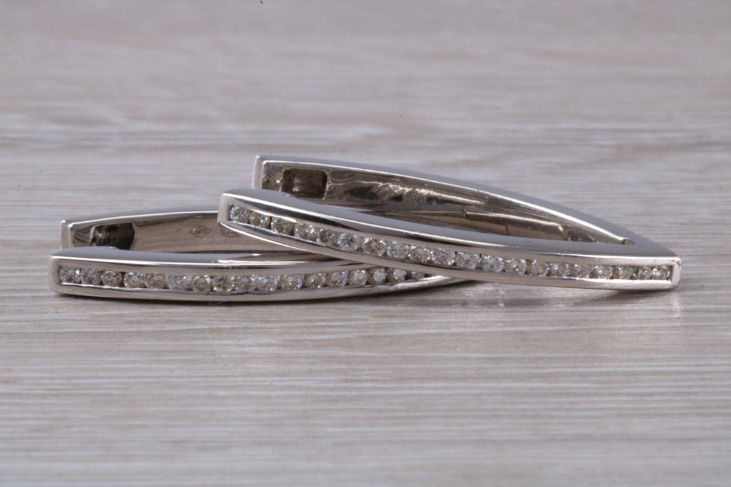 Very long Diamond set half hoop earrings. 18ct Gold with Latchback fittings, very very dressy earrings with top F VS1 grade Diamonds