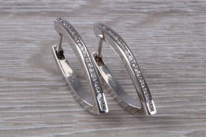 Very long Diamond set half hoop earrings. 18ct Gold with Latchback fittings, very very dressy earrings with top F VS1 grade Diamonds