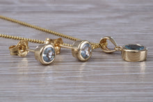 Load image into Gallery viewer, Round cut Aquamarine Matching Earrings and Necklace set in Yellow Gold