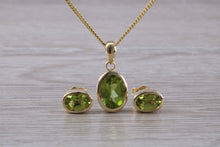 Load image into Gallery viewer, Oval cut Peridot Earrings and Matching Necklace set in Yellow Gold