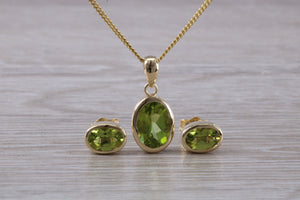 Oval cut Peridot Earrings and Matching Necklace set in Yellow Gold