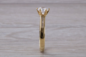 Beautiful Charles and Colvard 1 carat Mossainte with Natural Diamonds set Ring