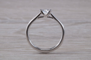 Petite and Simple Round cut Diamond Solitaire