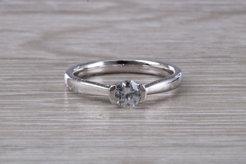 Petite and Simple Round cut Diamond Solitaire