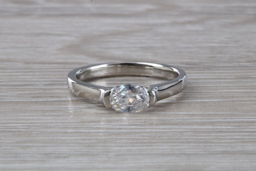 Half carat Oval cut Diamond set Platinum solitaire