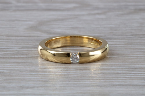 Chunky Yellow Gold Tension set Diamond Band