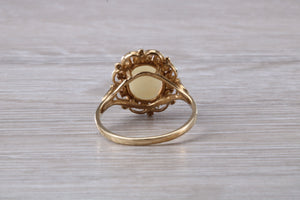 Oval cut Natural Opal set Yellow Gold Ring