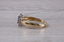 Load image into Gallery viewer, Tanzanite and Diamond Halo Ring