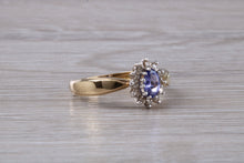 Load image into Gallery viewer, Tanzanite and Diamond Halo Ring