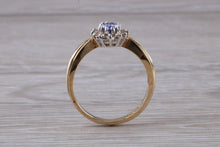 Load image into Gallery viewer, Tanzanite and Diamond Halo Ring