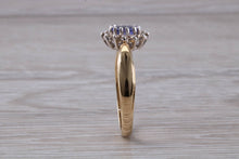 Load image into Gallery viewer, Tanzanite and Diamond Halo Ring