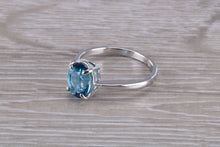 Load image into Gallery viewer, Oval cut Blue Topaz set Silver Ring