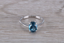 Load image into Gallery viewer, Oval cut Blue Topaz set Silver Ring