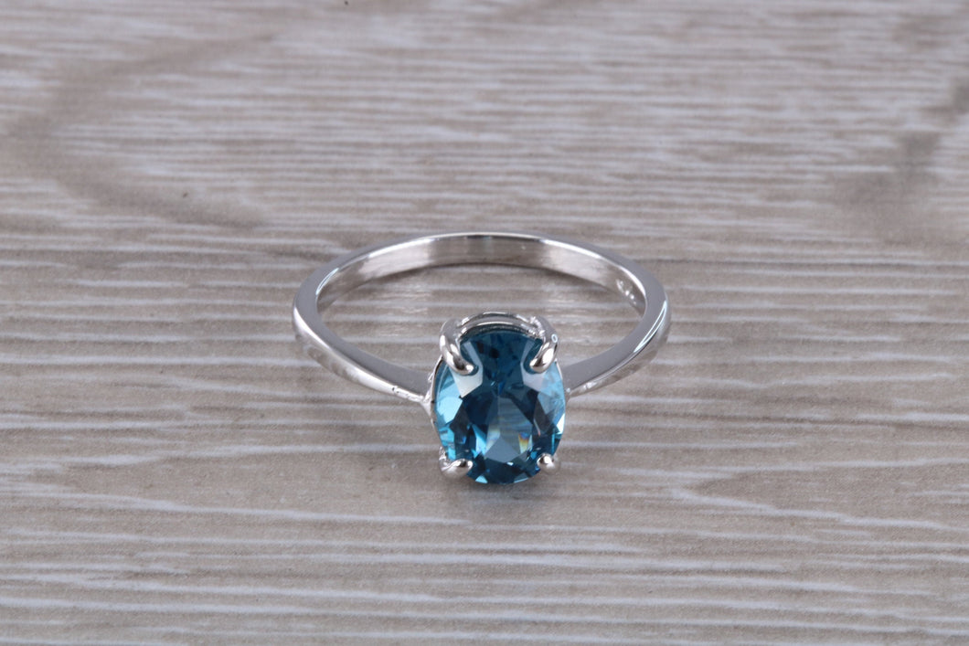 Oval cut Blue Topaz set Silver Ring