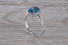 Load image into Gallery viewer, Oval cut Blue Topaz set Silver Ring