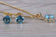 Load image into Gallery viewer, Round cut Blue Topaz Matching Stud Earrings and Necklace set in Yellow Gold