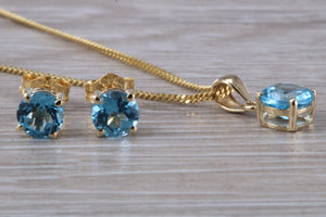 Round cut Blue Topaz Matching Stud Earrings and Necklace set in Yellow Gold