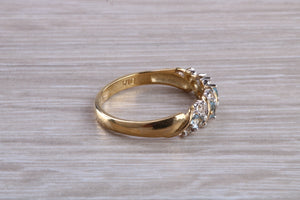 Blue topaz and diamond set ring. 9ct yellow gold with real diamonds and real topaz