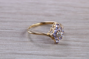 Tanzanite and Diamond set Yellow Gold Ring