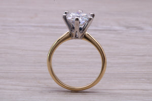 One carat Moissanite Diamond set Two Tone Gold Solitaire